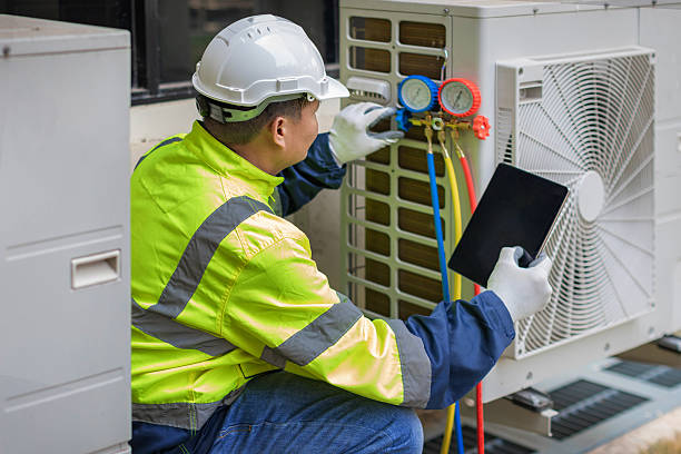 Professional Hvac Maintenance technician working in Montchanin, DE